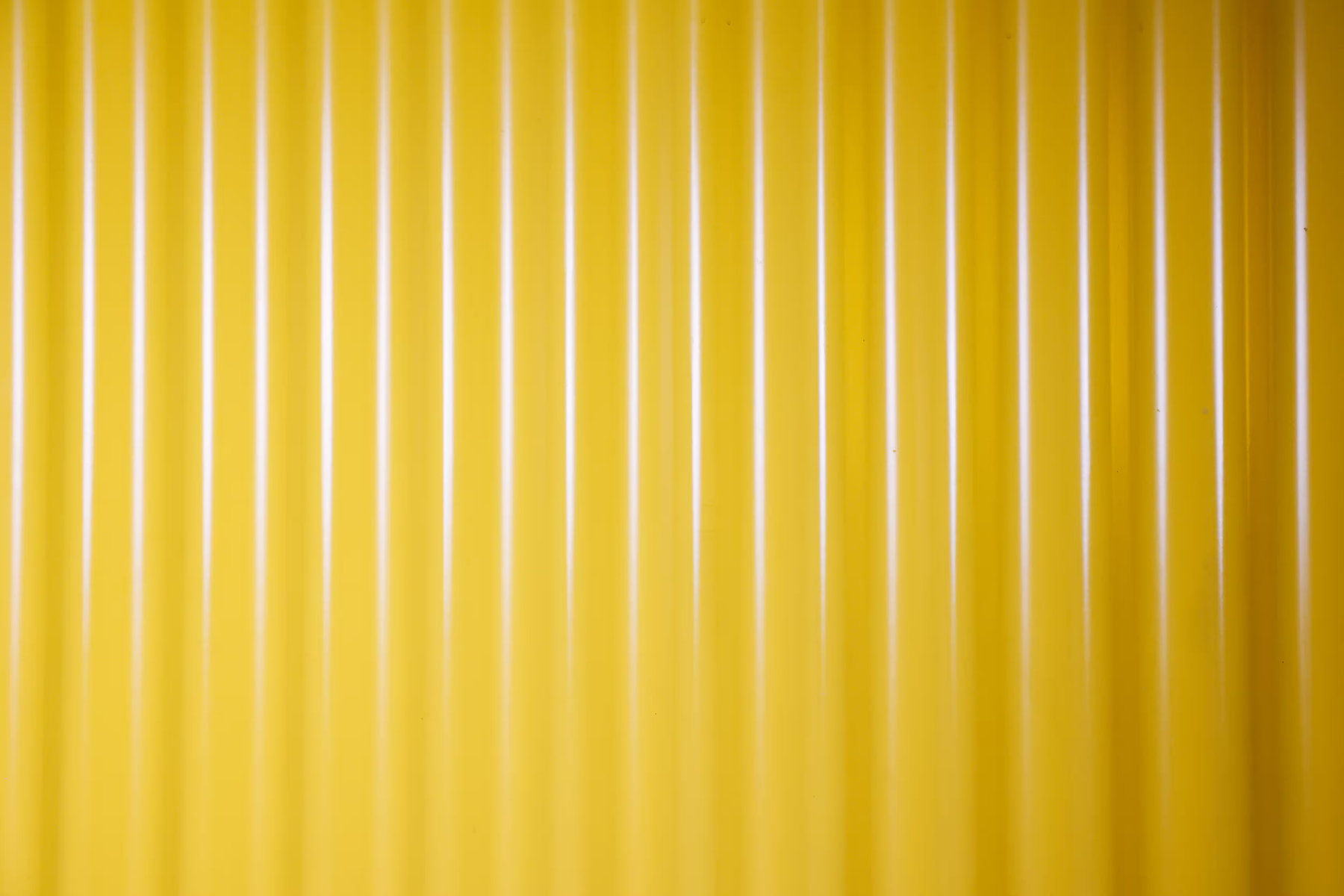 The yellow ribbed side of the truck